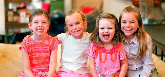 Four smiling children